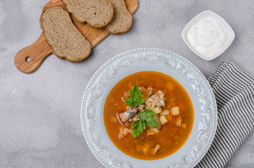 Traditional tomato fish soup