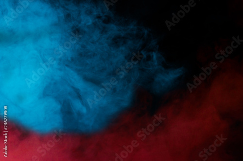Cloud Of Red And Blue Steam Over Dark Background Background For