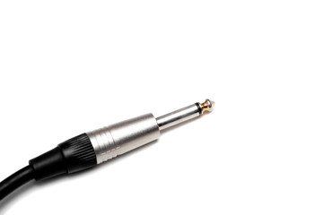 audio jack with black cable on white background.