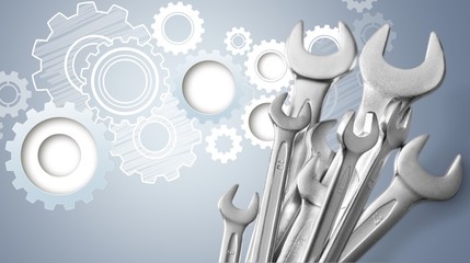 Metal wrench tools on background