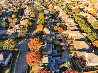 Aerial view planned unit development suburbs of Dallas, Texas, USA in autumn season. Flyover...