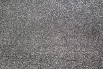 Silver shiny background. Selective focus.