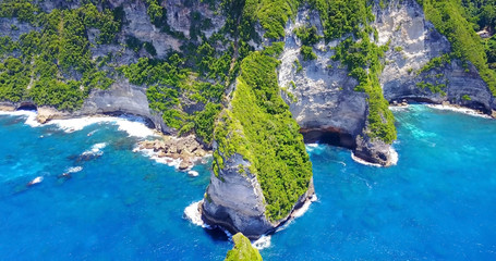 Aerial View Of Nusa Penida Banah Cliffs, Bali, Indonesia - Beautifual Tropical Coast With Rocky Cliffs Overlooking Turquoise Blue Cove