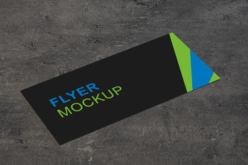 Flyer Mockup on Gray Stone Desktop