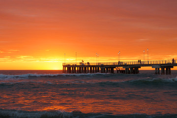 Fototapeta premium pier in a red sunset