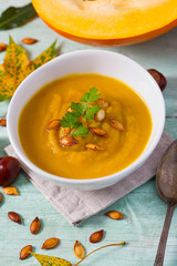 pumpkin soup on wooden surface