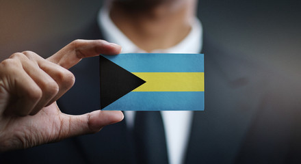 Businessman Holding Card of The Bahamas Flag