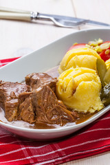 Roast turkey in gravy.