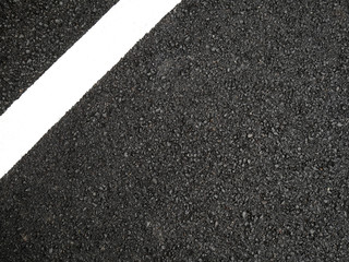 Fototapeta premium Black paved road background.