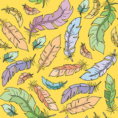 Flat style color bird feathers on yellow background seamless vector. Decoration pastel elements on white background.