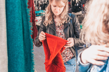 Gordes, Vaucluse/France - September 25, 2018: Attractive fashionable cute blonde in the market