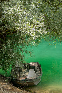 Little boat at Lake Chalain in Jura mountains, France.