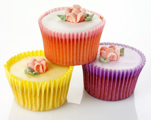 THREE PASTEL CUPCAKES