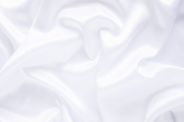 White cloth background abstract with soft waves.