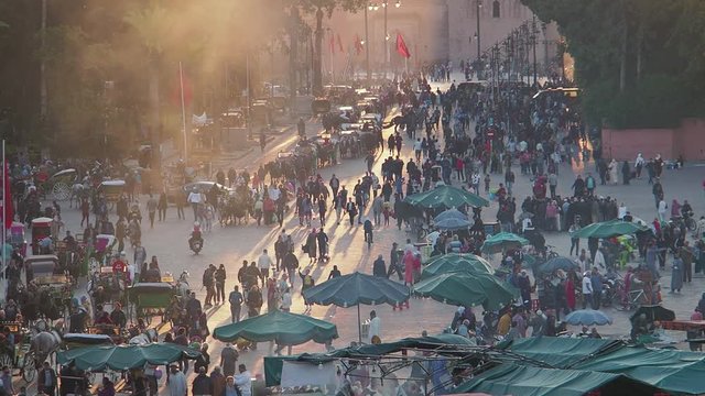 Crowds and activities in the late afternoon in the main square, Jemaa el-Fnaa, in Marakesh, Morocco