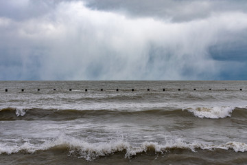 Dark Cold Day Along the Shore of Lake Michigan in Chicago with Waves