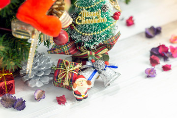 Christmas background with decorations and gift boxes on wooden