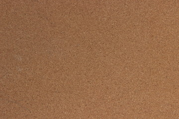 Empty blank cork board or bulletin board. Close up of corkboard texture