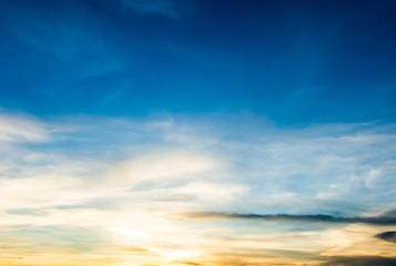 colorful dramatic sky with cloud at sunset.