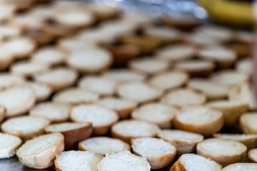 Sliced Bread Spread on a Table for Small Burgers