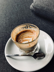 Glass of Picolo Latte Coffee on Sofa / Cortado