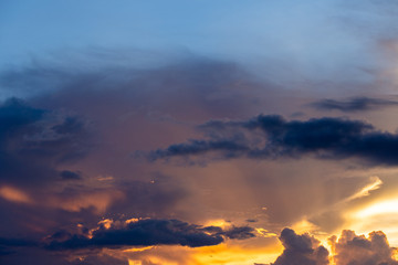 colorful dramatic sky with cloud at sunset.