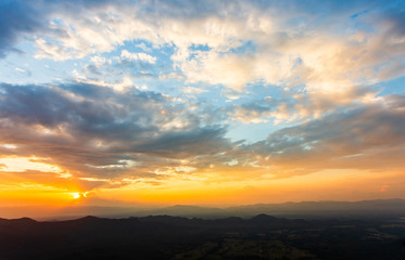 colorful dramatic sky with cloud at sunset.