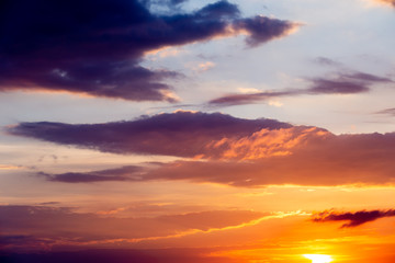 colorful dramatic sky with cloud at sunset.