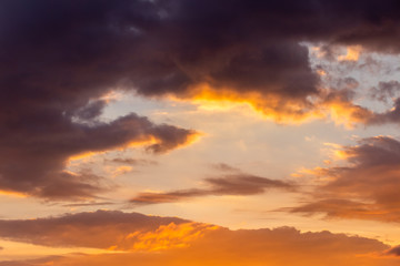 colorful dramatic sky with cloud at sunset.