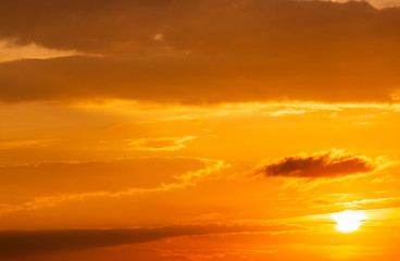 colorful dramatic sky with cloud at sunset.