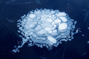 ice backaground, natural ice texture with frozen air bubbles