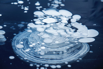 ice backaground, natural ice texture with frozen air bubbles
