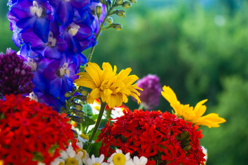 a bouquet of bright spring flowers of various types