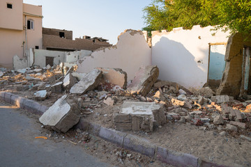 Destroyed building in city. War tragedy.
