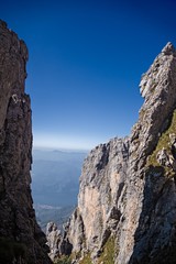 Panoramic view of the towers and spiers of the southern Grigna from the direct route, on a sunny autumn day.