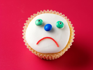 UNHAPPY FACE CUPCAKE