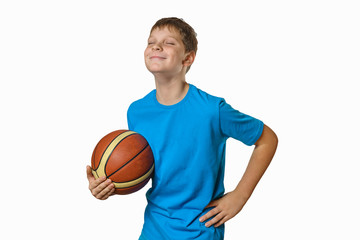 Obraz premium portrait of a teenage boy with a basketball ball on a white background, isolate, smiling with eyes closed