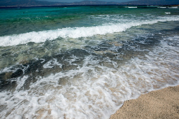 Beautiful beach with crystal clear sea and blue sky