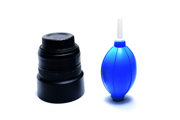 blue blower and black single lens reflex camera lens on white background isolated