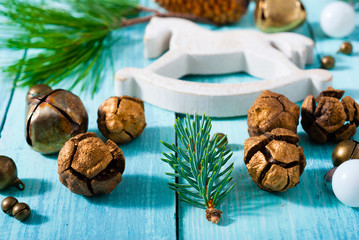 traditional Christmas ornaments on old blue wooden table background