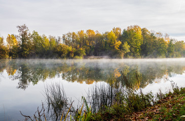 The Seine River with steam rising from water in Bray-sur-Seine, Northern France