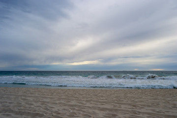 Horizontal landscape of a beach in a cloudy day Perth