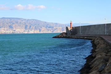 Dock with lighthouse