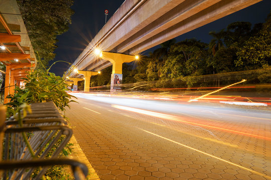 KUALA LUMPUR, MALAYSIA - NOVEMBER 18 2018 : Night Traffic Light Trail At Bandar Sunway In Front Of The Sunway City. In Conjunction With Artbox 2018 Event