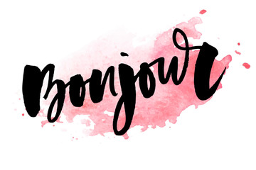 Vector poster calligraphy with Bonjour translation: Hello phrase abstract decor. Handdrawn brush elements in soft palette. Isolated typography card. Design lettering for t-shirt, sticker, print © 1emonkey
