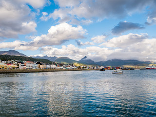 Fototapeta premium View from Beagle Channel of waterfront skyline of Ushuaia in Tierra del Fuego, Patagonia, Argentina
