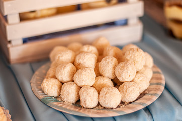 white coconut balls on a plate