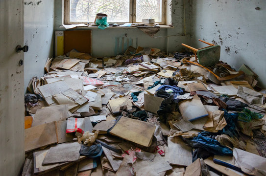 Medical documentation on floor in hospital No. 126, dead abandoned ghost town Pripyat in Chernobyl alienation zone, Ukraine