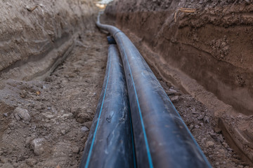sewer pipes with water are laid underground