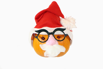 pumpkin dressed in santa claus